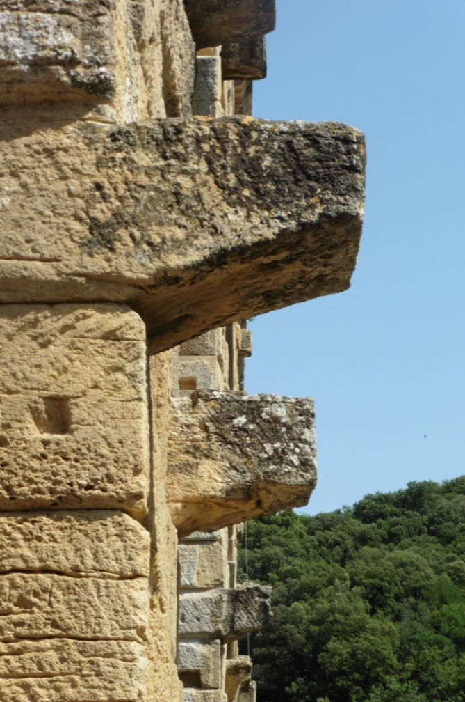 Detail of stone projections made to hold scaffolding.