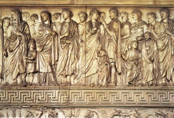 Roman men, women and children processing together toward an unseen goal.