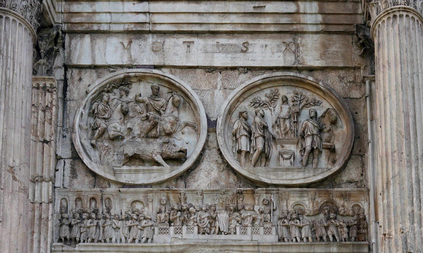 Two medallions and the frieze of Constantine demonstrate vastly different styles.