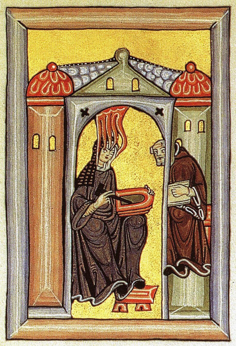 A woman sits in a building against a gold background. A monk peeks in the doorway.