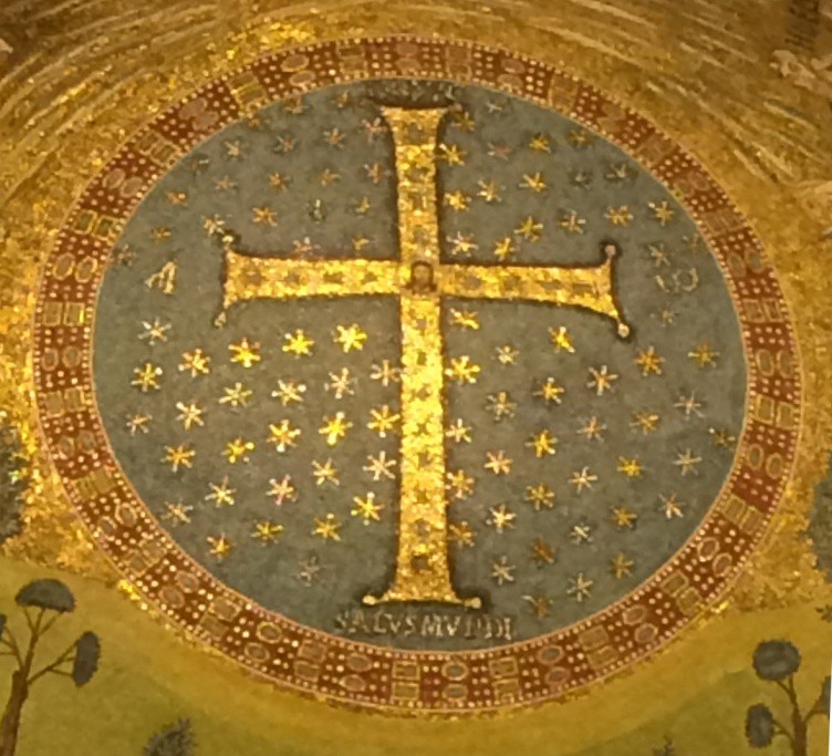 A nighttime view of the cross under artificial light makes the cross and stars sparkle.