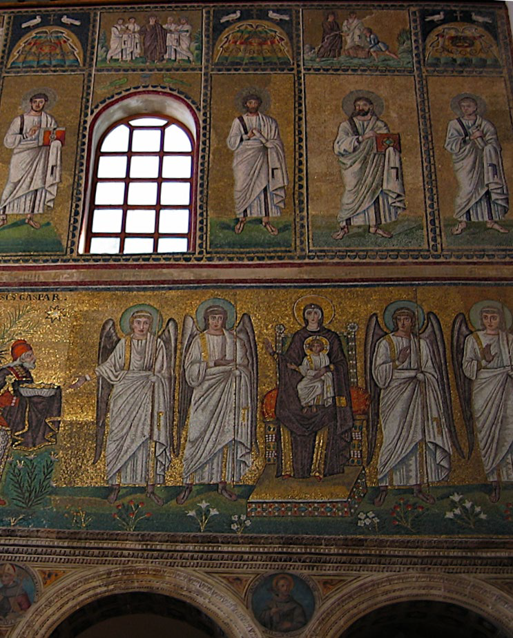 The Mary mosaic with a clerestory window above it and the distribution of the Loaves and Fishes above that.