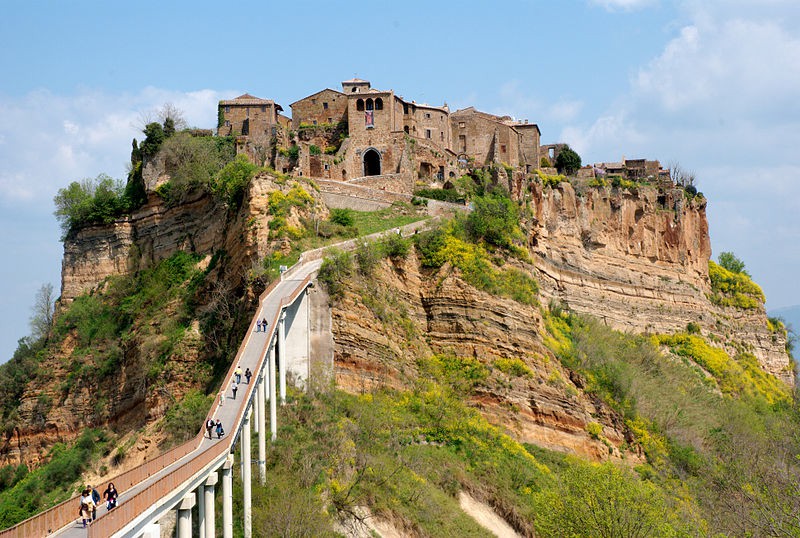 The 12th century fortress built on a Roman site where an Etruscan city once stood. The hill is steep and rocky.