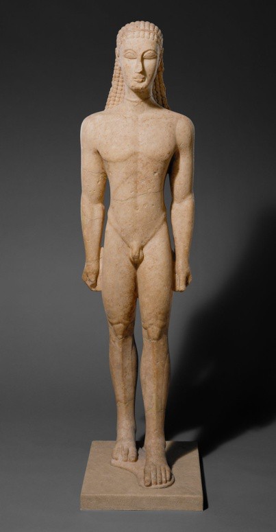 A Greek Kouros, nude and stiff.