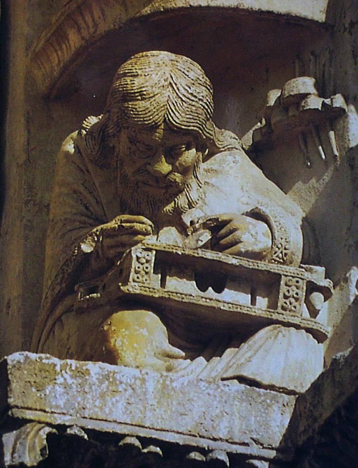 A detail of Pythagoras using a lap desk.