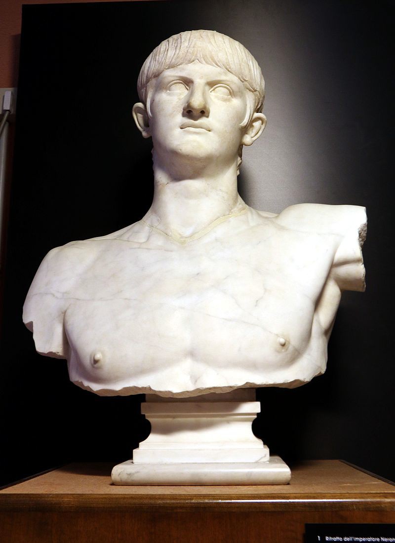 A marble bust of an idealized young man with close-cropped hair and a strong torso.