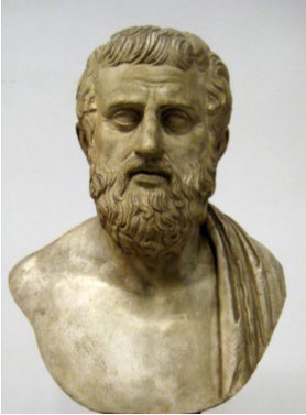 A bust of a bearded man in advanced years.