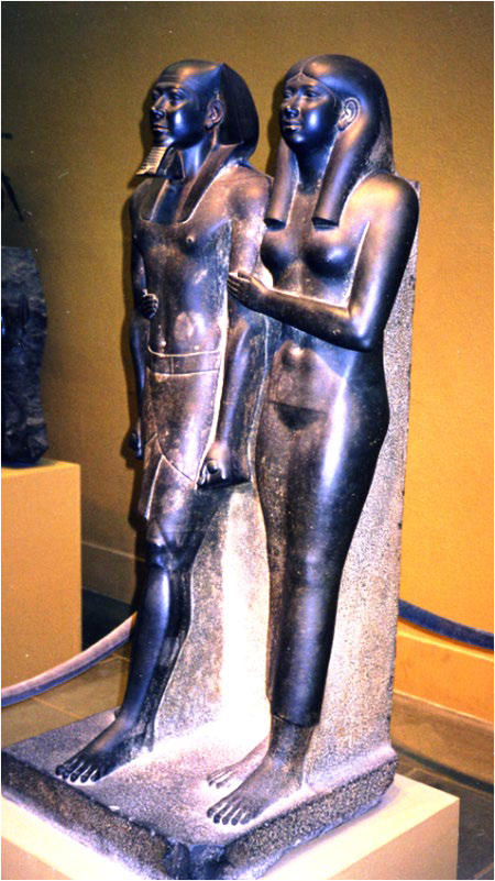Image of the carving of King Menkaure and his queen.