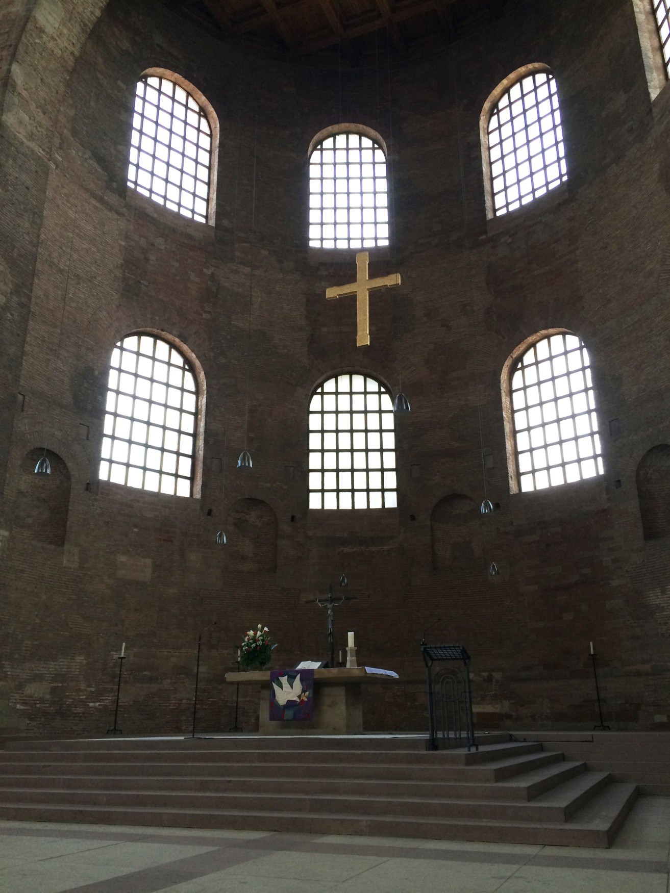 Five steps lead to a raised platform in the apse, on which the altar sits.