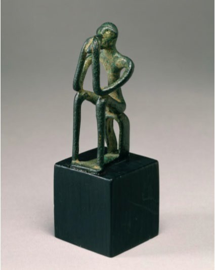Seated Male Figure, bronze.