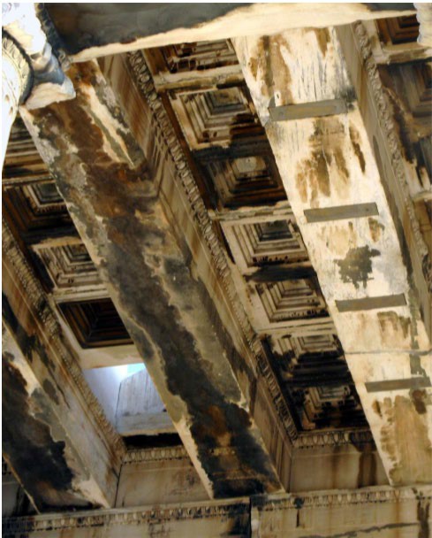 A photo of the coffered ceiling of the north porch reveals the massive supports that hold it up.