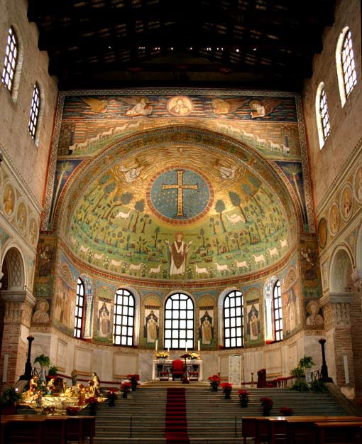 A close-up of the apse with the mosaic in the partial dome and the mosaics of a bishop between each pair of windows.