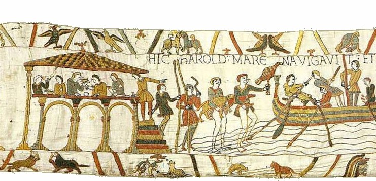 People under a roof drink and plan while others load a ship with the dogs and hawks of war.