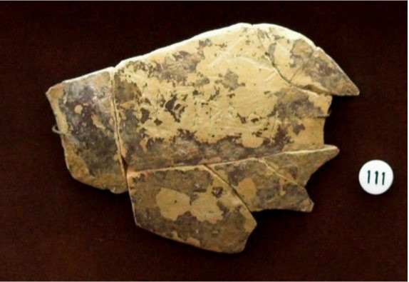 Fragment late geometric inscription on a Kotyle (a cup).