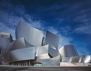 A photo of a building made of many parts that are not typical and do not seem to go together.