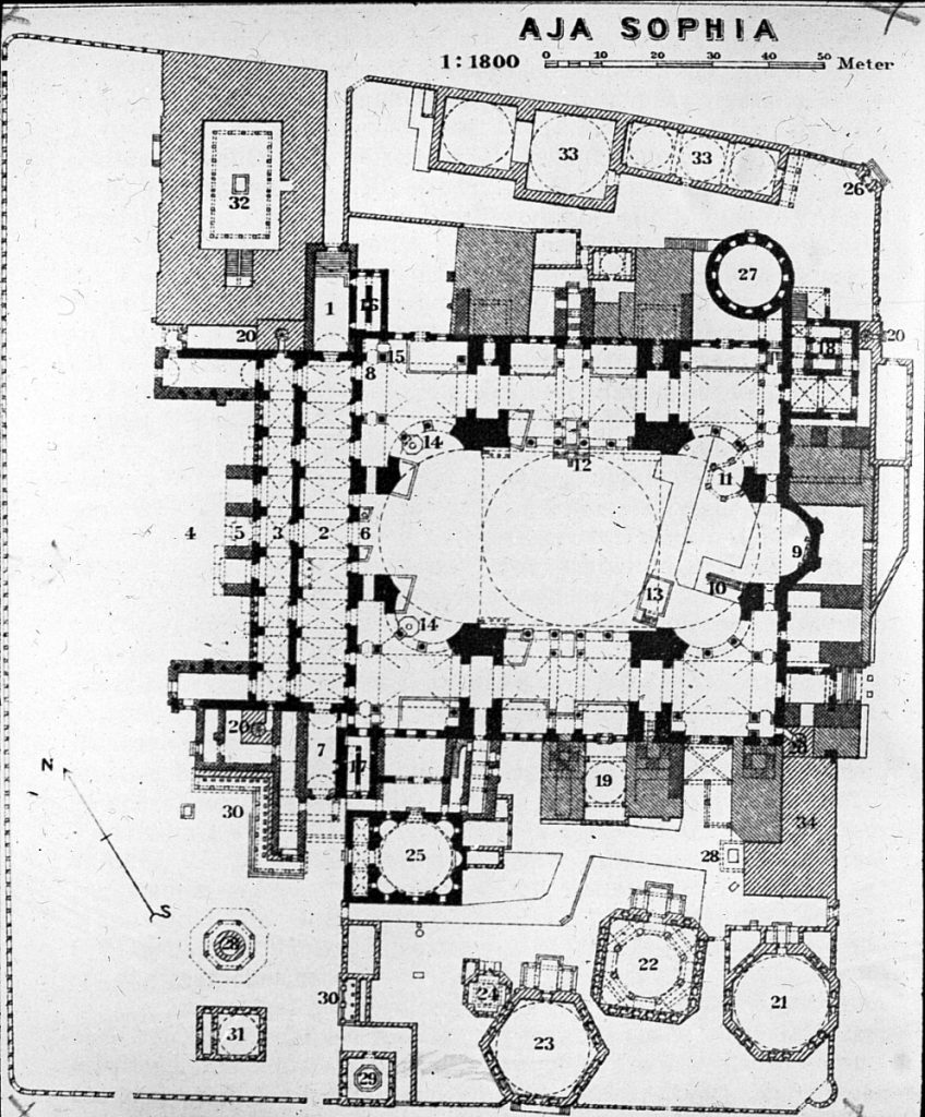 A ground plan of the complex building showing an open central area and many aisles and other smaller areas.