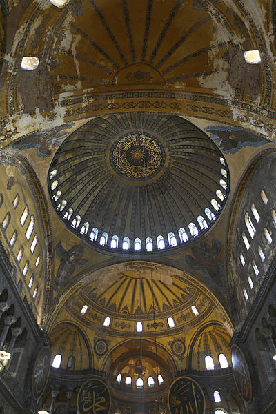 A view of the dome and surrounding apse and arches. These areas are decorated with mosaics.