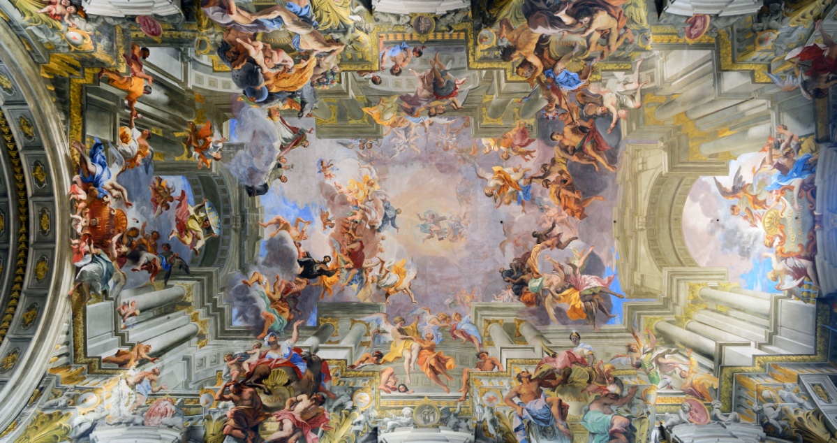 An elaborately painted ceiling of the heavens breaking through the architecture.