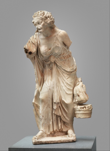 A sculpture of an old woman.