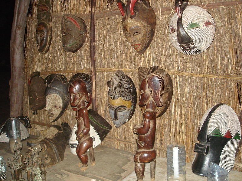 Mahogany and teak African masks.