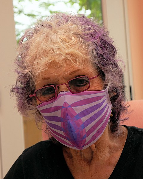 Judy Chicago with a Butterfly Mask during the COVID-19 pandemic