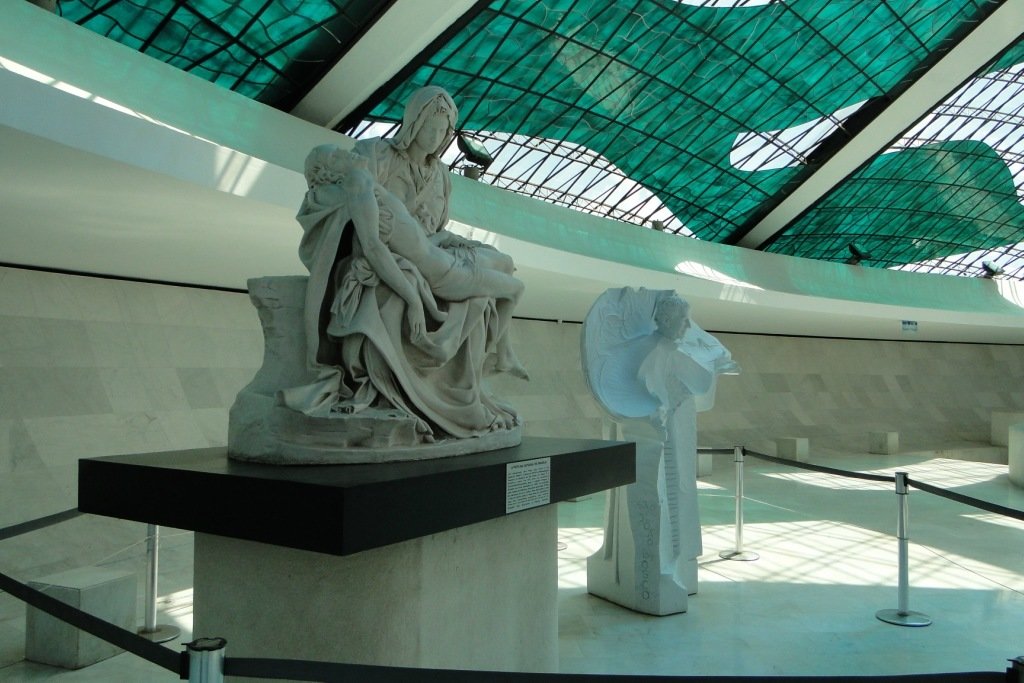 A copy of Michelangelo’s, Pieta. A second statue depicts São João Bosco