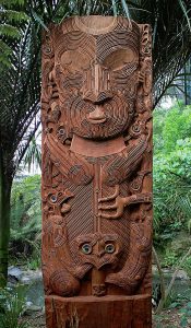 A carving of Tāne nui a Rangi, a Māori god, sited at the entrance to the forest aviary at Auckland Zoo.