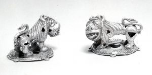 black and white photo of gold lion ornaments